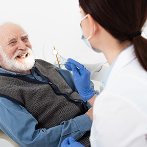 A man with dentures at the dentist